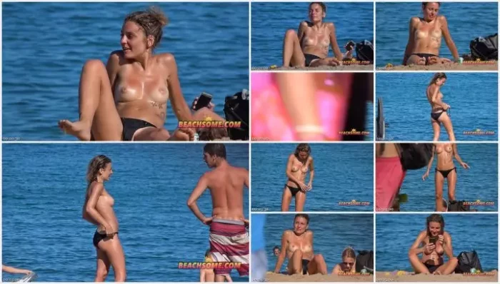 Beautiful young topless tits on beach